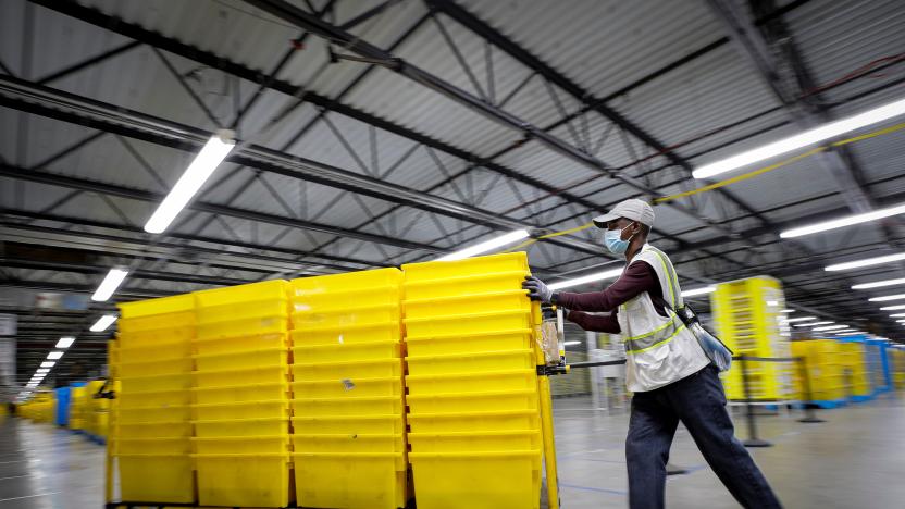 An employee works inside Amazon's JFK8 distribution center in Staten Island, New York, U.S. November 25, 2020.  REUTERS/Brendan McDermid.