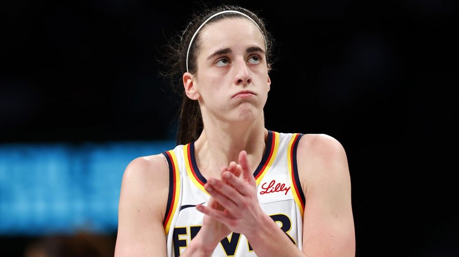 Associated Press - Indiana Fever guard Caitlin Clark (22) reacts during the second half of a WNBA basketball game against the New York Liberty , Saturday, May 18, 2024, in New York. The New York Liberty won 91-80. (AP Photo/Noah K. Murray)