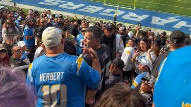 NFL fans fight at SoFi Stadium during Chargers-Raiders game