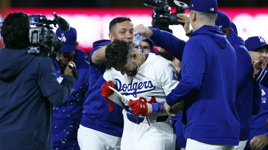 Getty Images - LOS ANGELES, CALIFORNIA - MAY 03:   Andy Pages #84 of the Los Angeles Dodgers celebrates a walk off win against the Atlanta Braves in the eleventh inning at Dodger Stadium on May 03, 2024 in Los Angeles, California. (Photo by Ronald Martinez/Getty Images)