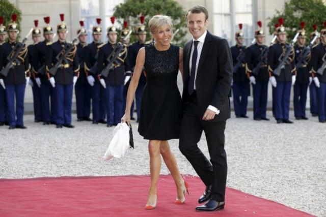 Emmanuel Macron and his wife, Brigitte Trogneux