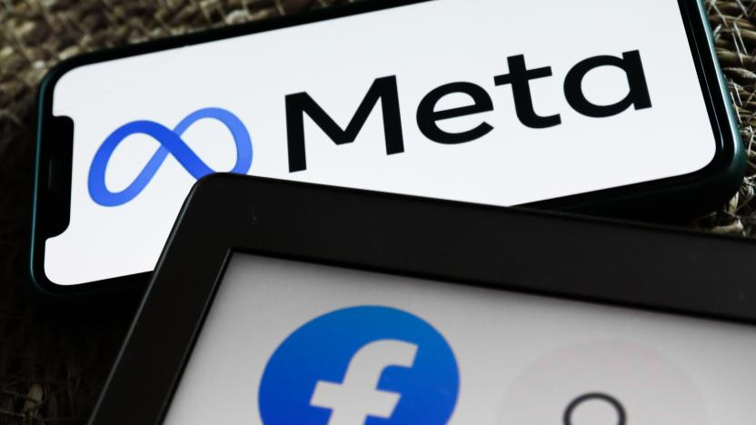 Meta logo displayed on a phone screen and Facebook icon displayed on a laptop screen are seen in this illustration photo taken in Krakow, Poland on October 29, 2021. (Photo by Jakub Porzycki/NurPhoto via Getty Images)