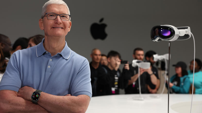 CUPERTINO, CALIFORNIA - JUNE 05: Apple CEO Tim Cook stands next to the new Apple Vision Pro headset is displayed during the Apple Worldwide Developers Conference on June 05, 2023 in Cupertino, California. Apple CEO Tim Cook kicked off the annual WWDC23 developer conference with the announcement of the new Apple Vision Pro mixed reality headset. (Photo by Justin Sullivan/Getty Images)