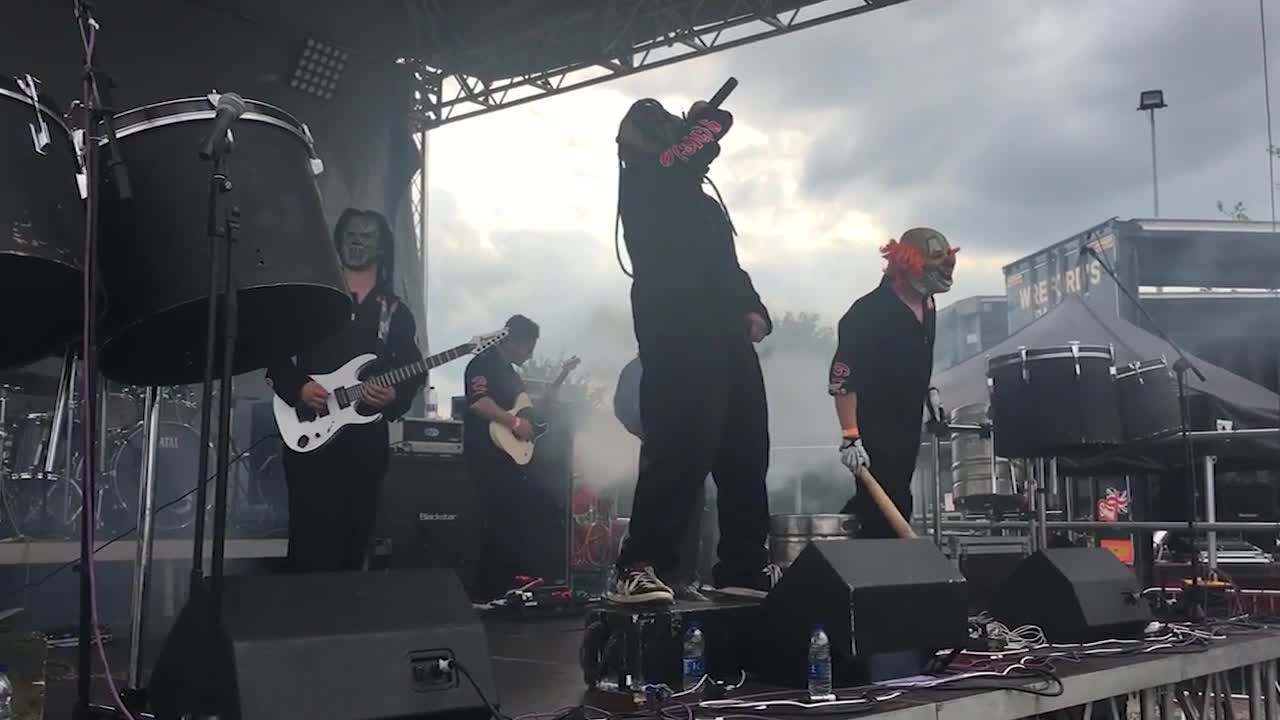 Policeman rocks out to heavy metal band at UK festival