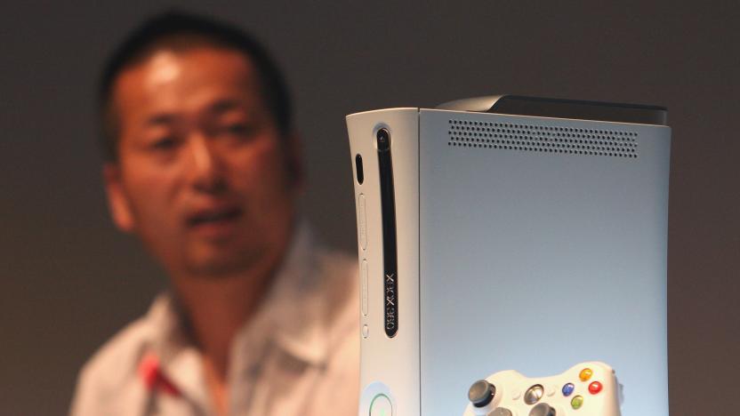 TOKYO - MAY 13: Microsoft's new Xbox360 game console is introduced during a press preview on May 13, 2005 in Tokyo, Japan. The machine is equipped with IBM's PowerPC on its CPU, 20GB HDD and 512MB RAM, and has a wireless controler. (Photo by Koichi Kamoshida/Getty Images)