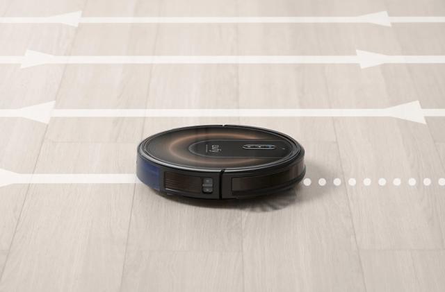 Anker's Eufy RoboVac G30 Edge robot vacuum with superimposed lines and arrows to show its travel path.