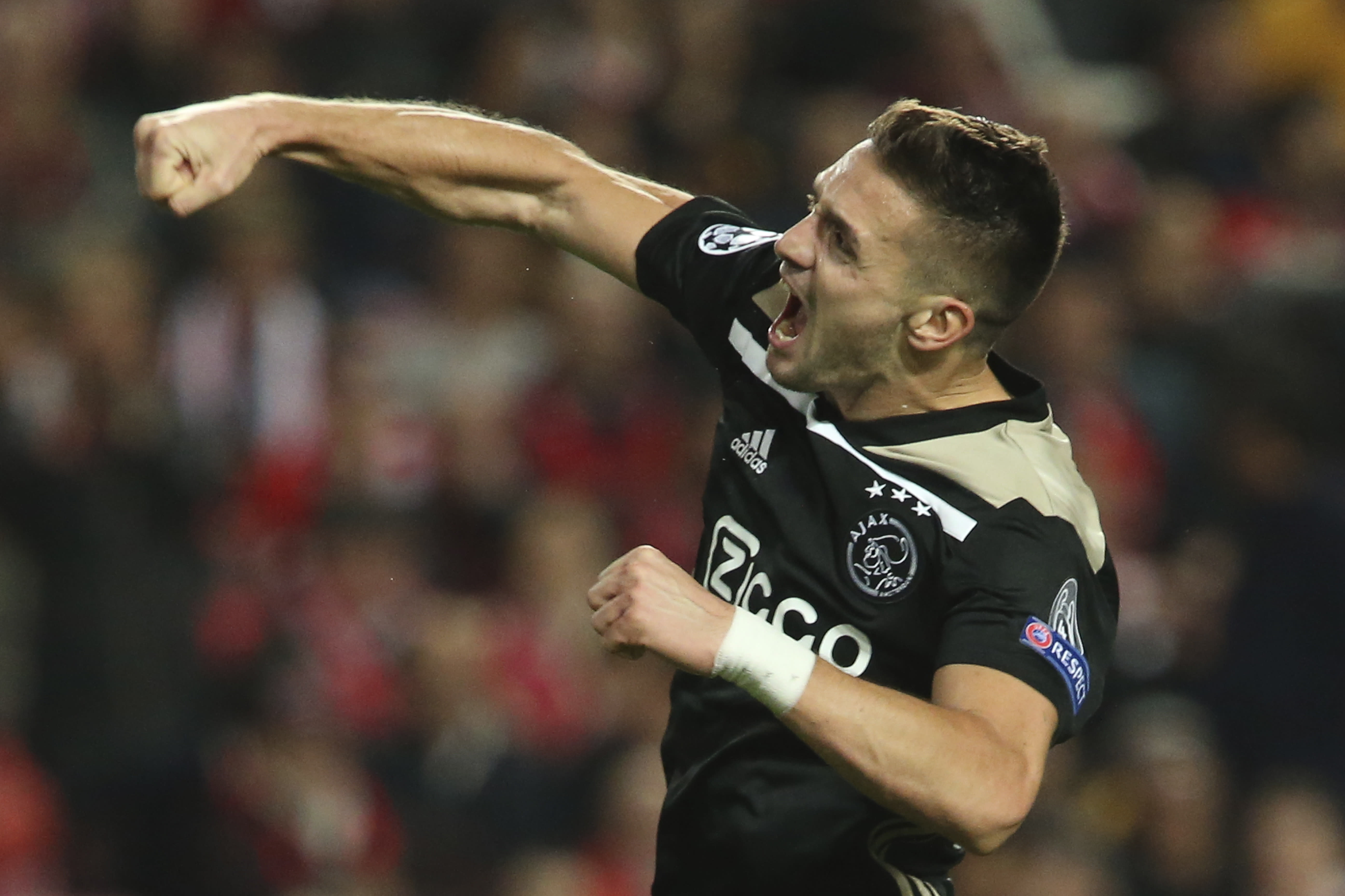 Ajax holds Benfica to 1-1 draw in Champions League
