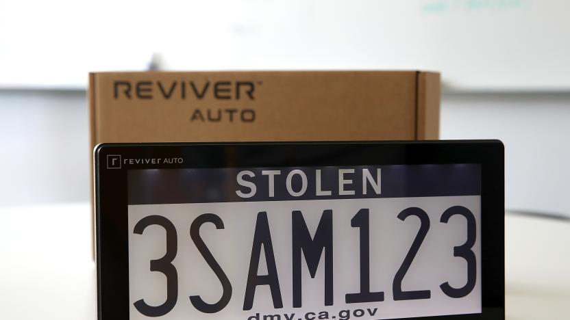 FOSTER CITY, CA - MAY 30:  A digital license plate made by Bay Area company Reviver Auto, part of a pilot project with the state Department of Motor Vehicles, is displayed at Reviver Auto headquarters on May 30, 2018 in Foster City, California. California is the first state in the U.S. to test digital license plates on vehicles. According to the California State Department of Motor Vehicles, there are currently 116 cars in California that are part of a pilot program testing the new plates that will eventually be sold at auto dealerships for $699 plus installation costs. Digital plates are expected to roll out in Florida, Arizona, and Texas later this year.  (Photo by Justin Sullivan/Getty Images)