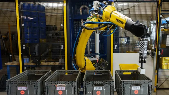 Amazon's latest robot picker for warehouses uses AI to identify objects