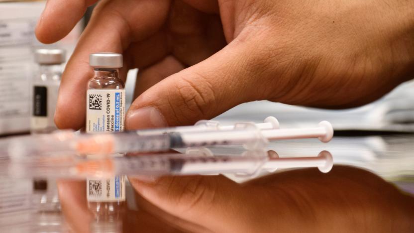 Vials and syringes of the Johnson and Johnson Janssen Covid-19 vaccine are displayed for a photograph at a Culver City Fire Department vaccination clinic on August 5, 2021 in Culver City, California. (Photo by Patrick T. FALLON / AFP) (Photo by PATRICK T. FALLON/AFP via Getty Images)