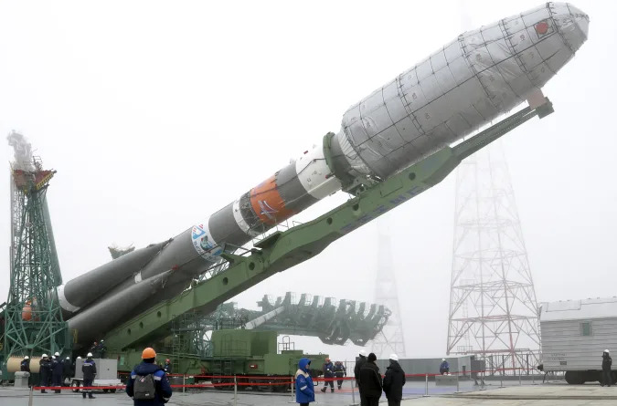 KAZAKHSTAN MARCH 2, 2022: A Soyuz-2.1b rocket booster with a Fregat upper stage carrying British OneWeb satellites is being installed on a launch pad at the Baikonur Cosmodrome. The launch is scheduled for 5 March 2022 at 01:41 Moscow time. Roscosmos Press Office/TASS THIS IMAGE WAS PROVIDED BY A THIRD PARTY. EDITORIAL USE ONLY (Photo by Roscosmos Press OfficeTASS via Getty Images)