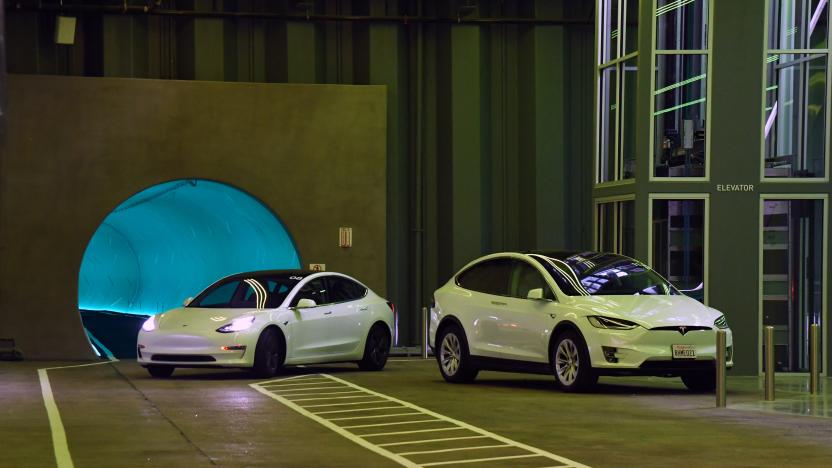 LAS VEGAS, NEVADA - APRIL 09:  Tesla cars drive in the Central Station during a media preview of the Las Vegas Convention Center Loop on April 9, 2021 in Las Vegas, Nevada. The Las Vegas Convention Center Loop is an underground transportation system that is the first commercial project by Elon Musk’s The Boring Company. The USD 52.5 million loop, which includes two one-way vehicle tunnels 40 feet beneath the ground and three passenger stations, will take convention attendees across the 200-acre convention campus for free in all-electric Tesla vehicles in under two minutes. To walk that distance can take upward of 25 minutes. The system is designed to carry 4,400 people per hour using a fleet of 62 vehicles at maximum capacity. It is scheduled to be fully operational in June when the facility plans to host its first large-scale convention since the COVID-19 shutdown. There are plans to expand the system throughout the resort corridor in the future.  (Photo by Ethan Miller/Getty Images)