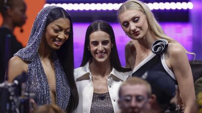 Associated Press - From left, LSU's Angel Reese, Iowa's Caitlyn Clark, and Stanford's Cameron Brink, pose for a photo before the start of the WNBA basketball draft, Monday, April 15, 2024, in New York. (AP Photo/Adam Hunger)