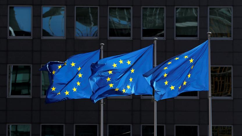 European Union flags flutter outside the European Commission headquarters in Brussels, Belgium August 21, 2020. REUTERS/Yves Herman