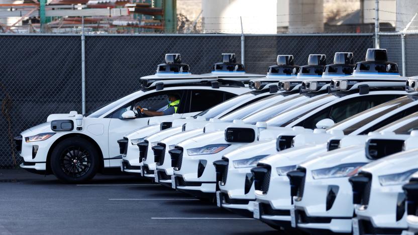 A worker parks a Jaguar I-Pace electric vehicle at Waymo's operations center in the Bayview district of San Francisco, California, U.S. October 19, 2021. Picture taken October 19, 2021.  REUTERS/Peter DaSilva