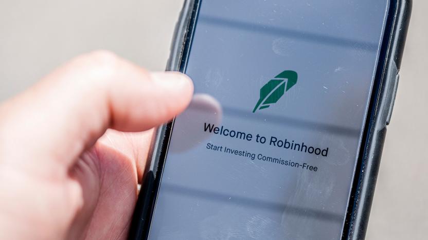 The Robinhood vestment app is see on a smartphone in this photo illustration on June 24, 2020 in Washington,DC. - After the suicide of one of his clients, convinced that he had lost hundreds of thousands of dollars, the online broker Robinhood came under heavy criticism. Popular with millennials, the platform is accused by its detractors of trivializing stock market transactions. (Photo by JIM WATSON / AFP) (Photo by JIM WATSON/AFP via Getty Images)