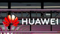 FILE PHOTO: A logo for Huawei is seen during the KubeCon + CloudNativeCon Europe in Paris