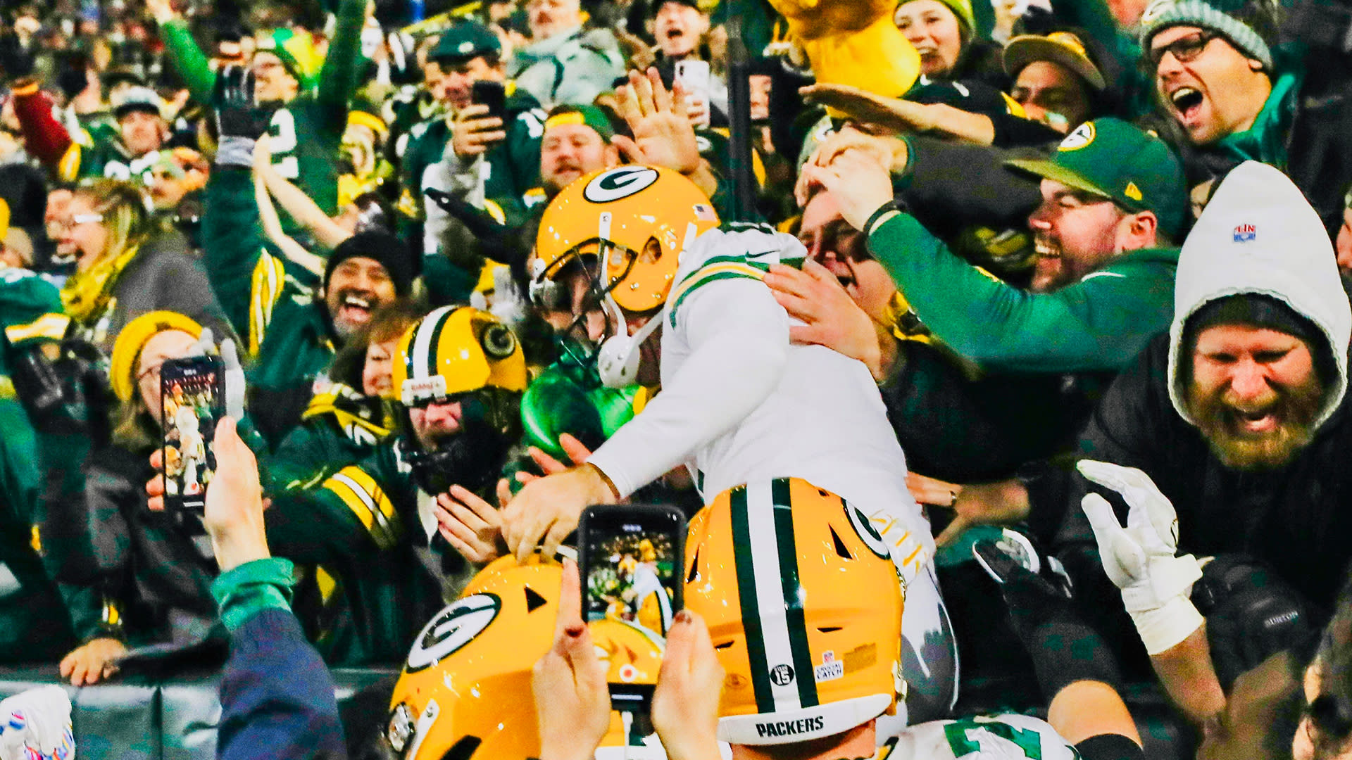 Celebrity Packers fans cheering for the Green and Gold