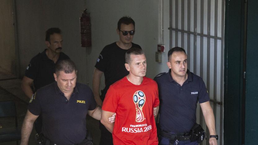 Courts in Thessaloniki, Greece rules extradition of the Russian bitcoin master suspect Alexander Vinnik to France after the French authorities request. Vinnik claimed that if the crimes have occurred in Greece, then he should be judged in Greek courts and appealed the court's decision. Alexander Vinnik was wearing a red Fifa World Cup - Russia 2018 t-shirt. Thessaloniki, Greece - July 13, 2018 (Photo by Nicolas Economou/NurPhoto via Getty Images)