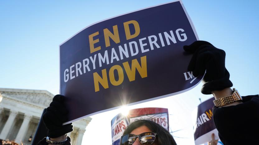 Demonstrators protest during a Fair Maps rally outside the U.S. Supreme Court, in Washington, U.S., March 26, 2019.  REUTERS/Brendan McDermid