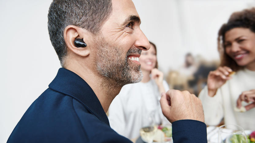 A man is pictured wearing Sennheiser's new earbud-style hearing aid.