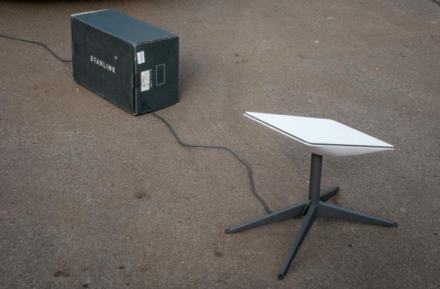 A Starlink satellite-based broadband system is seen at a mobile passport application station installed by the State Migration Service in Shevchenk, Kharkiv region, on September 29, 2022. (Photo by Yasuyoshi CHIBA / AFP) (Photo by YASUYOSHI CHIBA/AFP via Getty Images)