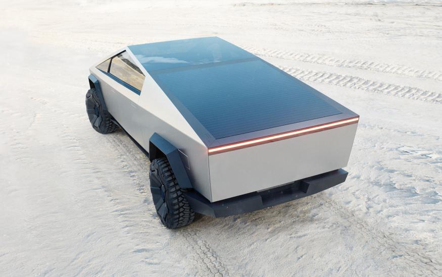 A product photo of Tesla's Cybertruck against a desert-like backdrop.