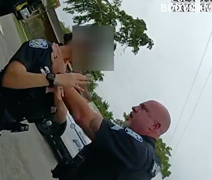 Cop Seen On Video Grabbing Fellow Officer By Her Throat