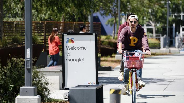 MOUNTAIN VIEW, CA - MAY 01: People ride bikes past signage on the Google campus as Google workers inside hold a sit-in to protest sexual harassment at the company, on May 1, 2019 in Mountain View, California. (Photo by Michael Short/Getty Images)