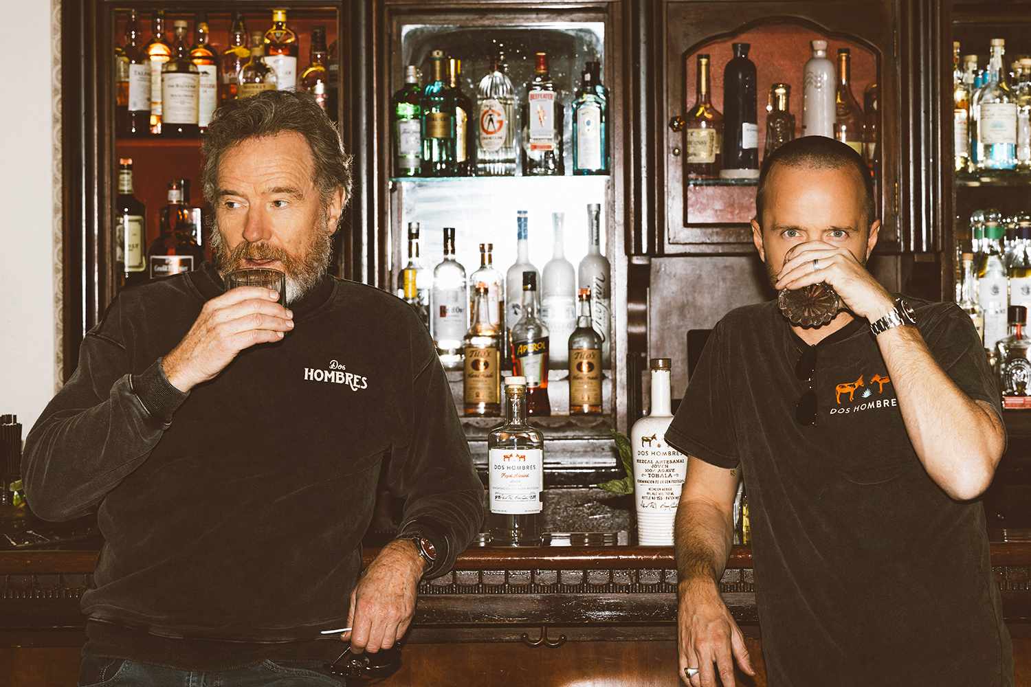 Why Aaron Paul and Bryan Cranston Say It's 'Sacrilegious to Take a Shot' of Their Dos Hombres Mezcal (Exclusive)