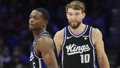 Getty Images - PHILADELPHIA, PENNSYLVANIA - JANUARY 12: Domantas Sabonis #10 and De'Aaron Fox #5 of the Sacramento Kings look on against the Philadelphia 76ers at the Wells Fargo Center on January 12, 2024 in Philadelphia, Pennsylvania. NOTE TO USER: User expressly acknowledges and agrees that, by downloading and or using this photograph, User is consenting to the terms and conditions of the Getty Images License Agreement. (Photo by Mitchell Leff/Getty Images)