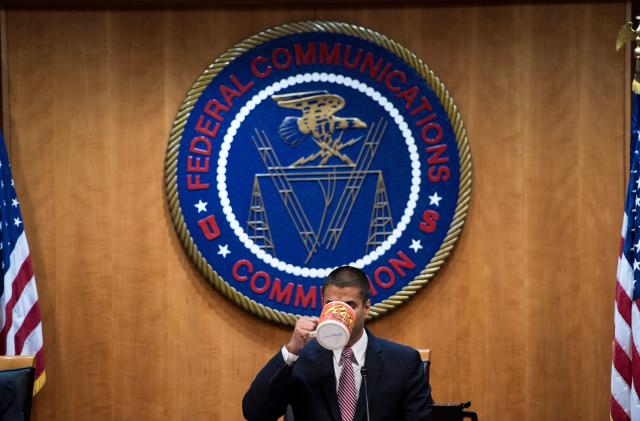 FCC Chairman Ajit Pai listens during a hearing at the Federal Communications Commission on December 14, 2017 in Washington, DC. / AFP PHOTO / Brendan Smialowski        (Photo credit should read BRENDAN SMIALOWSKI/AFP via Getty Images)