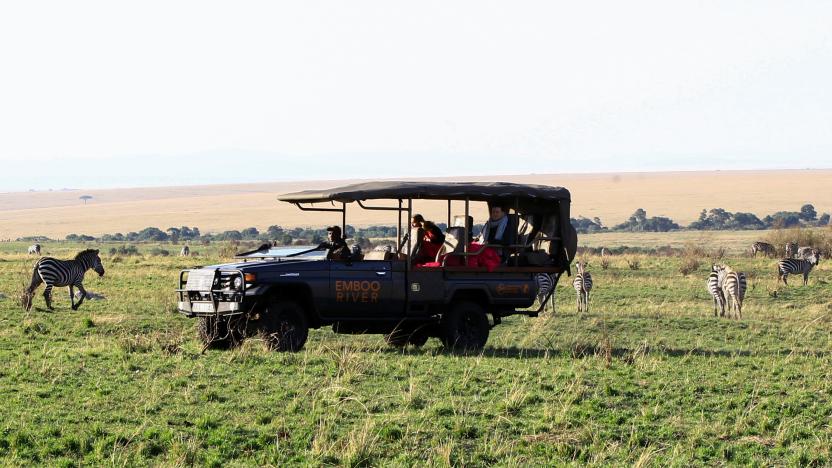 Sylvester Mukenye, a tour guide at the Emboo River Camp drives an electric-powered safari vehicle during a game drive safari at the Maasai Mara National Reserve in Narok County, Kenya July 16, 2021. Picture taken July 16, 2021. REUTERS/Monicah Mwangi