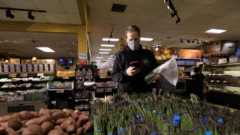 CLARK, NEW JERSEY - JANUARY 08: Clark resident Jen Valencia still works part time for Instacart, shopping for two customers at a ShopRite on January 08, 2022 in Clark, New Jersey. Instacart expects growth in grocery delivery to increase and not revert back to pre-pandemic methods, particularly with new variants of Covid still emerging. (Photo by Michael Loccisano/Getty Images)