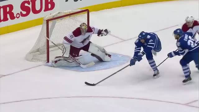 Troy Bodie backhands home the rebound