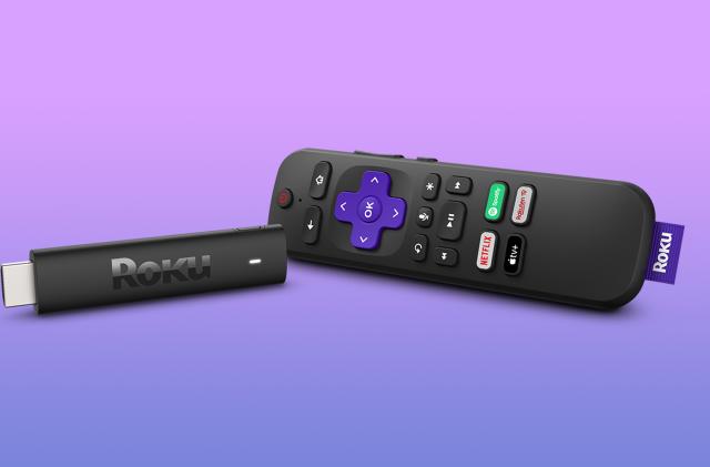 The Roku Streaming Stick 4K seen against a purple gradient background.