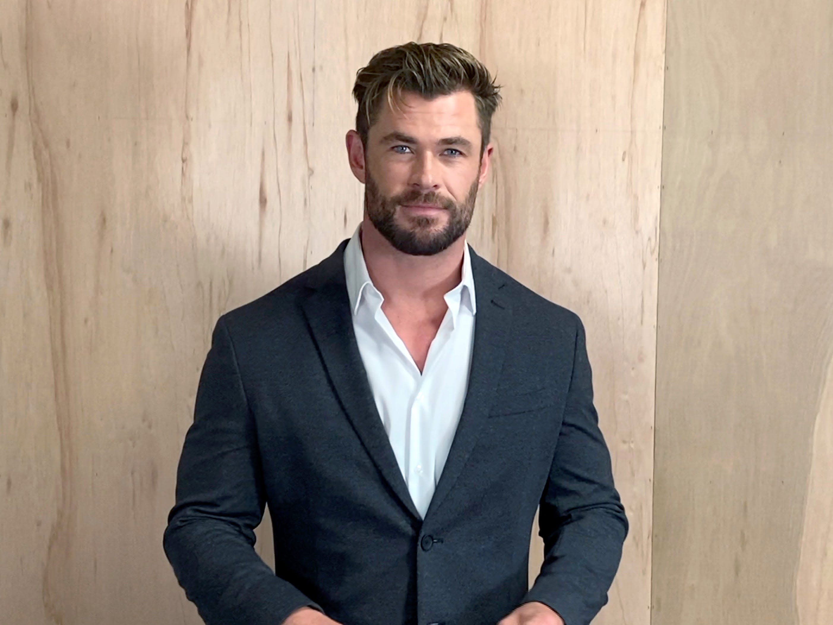 Chris Hemsworth posted a photo of his enormous arms - but people are just  commenting on his skinny legs