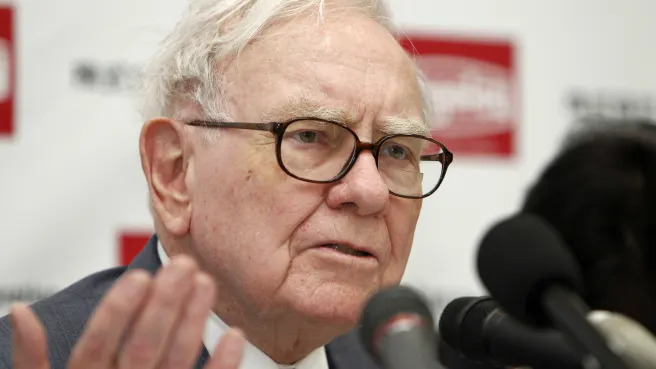 Buffett says taxes may rise to offset widening US deficits