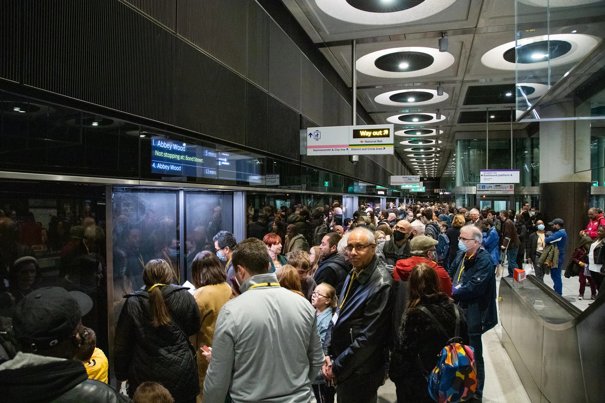 Crossrail passengers waiting at a new platform