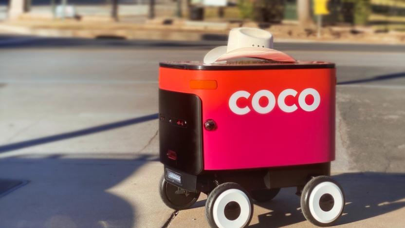 Coco delivery robot with a cowboy hat on top.