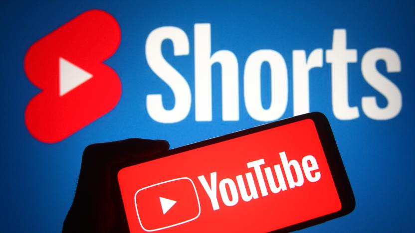 UKRAINE - 2021/10/23: In this photo illustration a YouTube logo of an online video sharing and social media platform is seen on a smartphone screen with a YouTube Shorts in the background. (Photo Illustration by Pavlo Gonchar/SOPA Images/LightRocket via Getty Images)