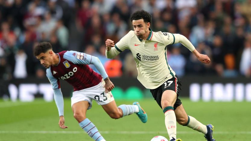 BIRMINGHAM, ENGLAND - MAY 10: Curtis Jones of Liverpool beats Philippe Coutinho of Aston Villa during the Premier League match between Aston Villa and Liverpool at Villa Park on May 10, 2022 in Birmingham, England. (Photo by Alex Livesey - Danehouse/Getty Images)