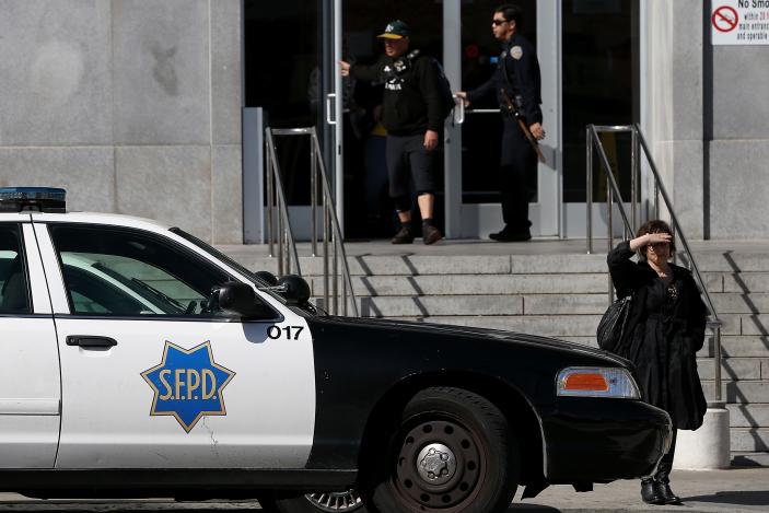 SAN FRANCISCO, CA - FEBRUARY 27:  A San Francisco police car sits parked in front of the Hall of Justice on February 27, 2014 in San Francisco, California.  A federal grand jury has indicted five San Francisco police officers and one former officer in two cases involving drug and computer thefts from suspects and the theft of money and gift cards from suspects. (Photo by Justin Sullivan/Getty Images)