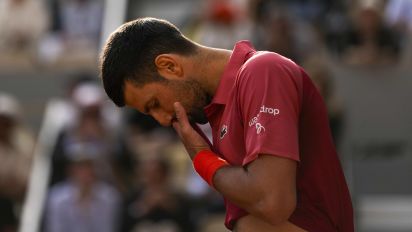 Associated Press - Serbia's Novak Djokovic reacts after missing a shot against Argentina's Francisco Cerundolo during their fourth round match of the French Open tennis tournament at the Roland Garros stadium in Paris, Monday, June 3, 2024. (AP Photo/Thibault Camus)
