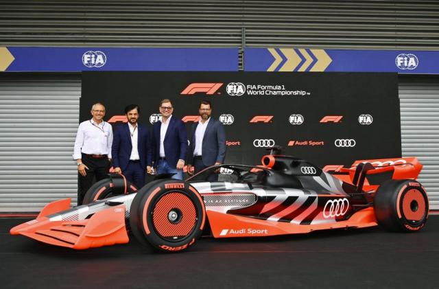 Formula 1 President and CEO Stefano Domenicali, FIA President Mohammed Ben Sulayem, Chairman of the Board of Management of AUDI AG Markus Duesmann and Member of the Board of Management for Technical Development Oliver Hoffmann reveal Audi’s liveried showcar in the pit lane at Spa