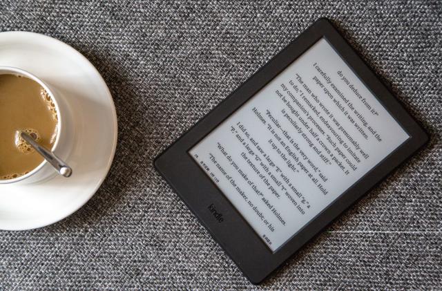 CHONGQING, CHINA - 2016/08/16: Kindle on a sofa.  Amazon released a new entry level Kindle in the mid of 2016.  Now Amazon has a whole and largest e-book ecosystem. (Photo by Zhang Peng/LightRocket via Getty Images)