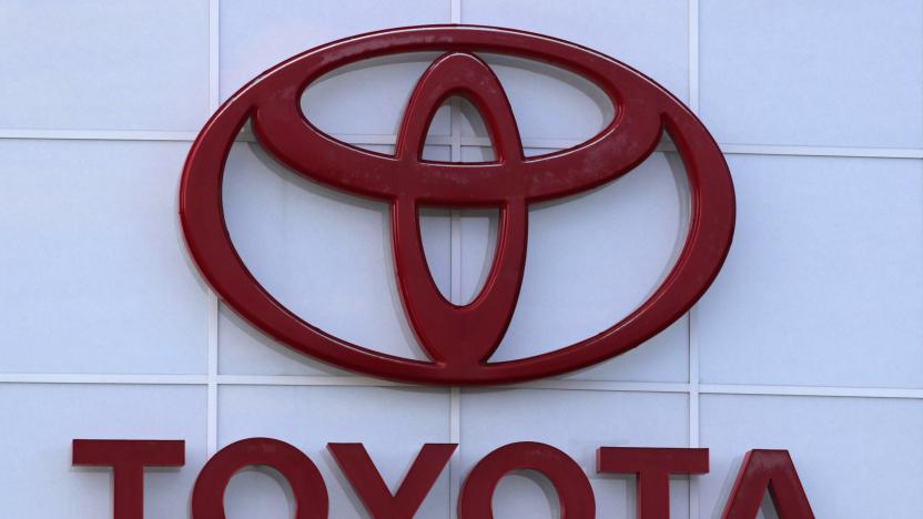 FILE - The Toyota logo is seen on a dealership, Aug. 15, 2019, in Manchester, N.H. Toyota said Wednesday, Nov. 1, 2023, that it is recalling nearly 1.9 million RAV4 small SUVs in the U.S. to fix a problem with batteries that can move during forceful turns and potentially cause a fire. (AP Photo/Charles Krupa, File)