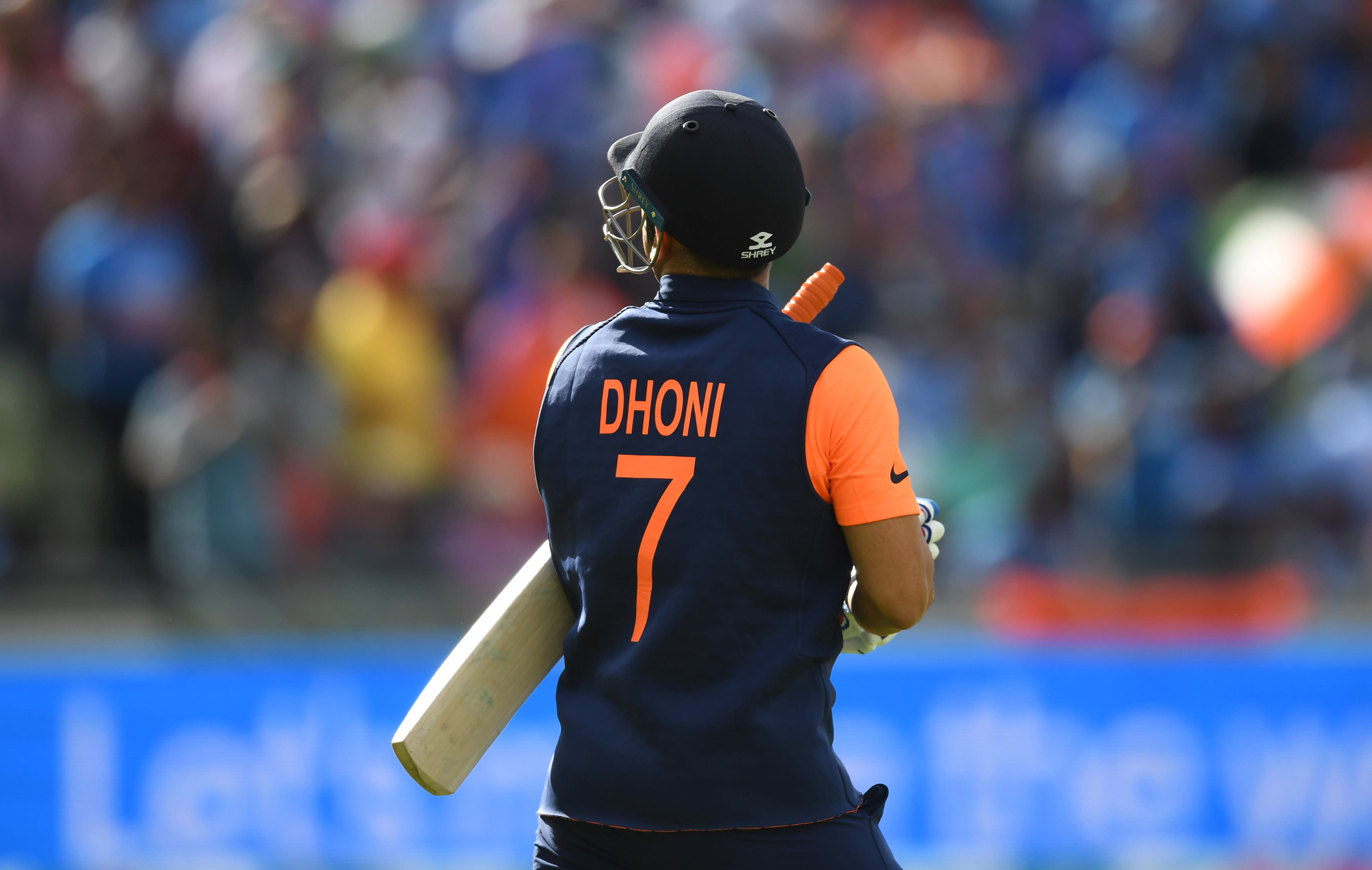 dhoni in orange jersey