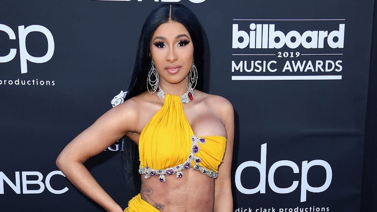 Cardi B Showed Off A Louis Vuitton-Imprinted Ponytail On Instagram