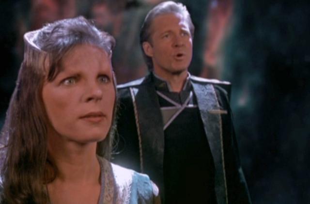 A still image from the Babylon 5 TV series showing two characters staring ahead into the distance.